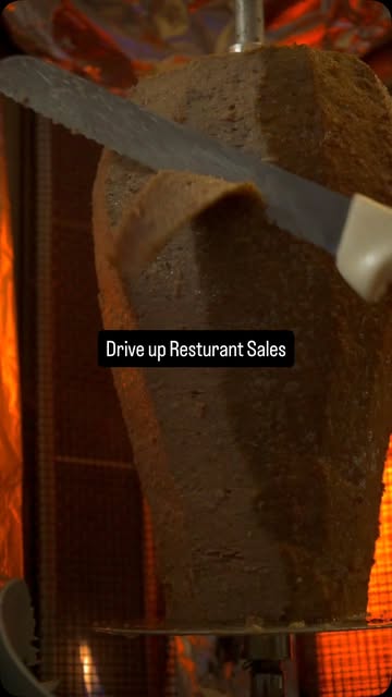 Warm restaurant content featuring food preparation